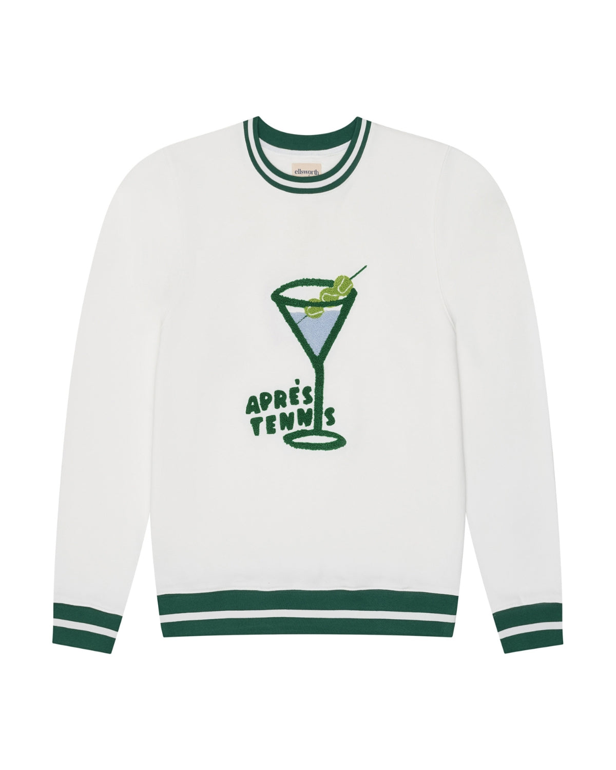 White long-sleeve crewneck sweatshirt with dark green ribbed collar, cuffs, and hem, featuring a green martini glass graphic with the text 'APRÈS TENNIS' on the front. Elle Apres Tennis Sweatshirt by Ellsworth + Ivey.