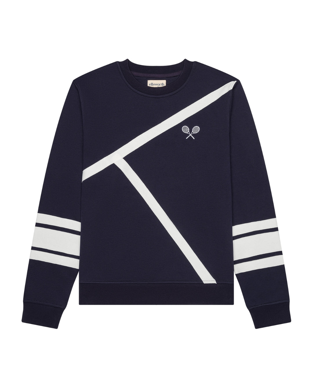 A navy blue crewneck women's sweatshirt with diagonal and intersecting white graphic stripes across the front, white double stripes on the sleeves, and a small embroidered tennis racket logo on the left chest. Elle Sweatshirt - Tennis Lines in Navy by Ellsworth + Ivey.