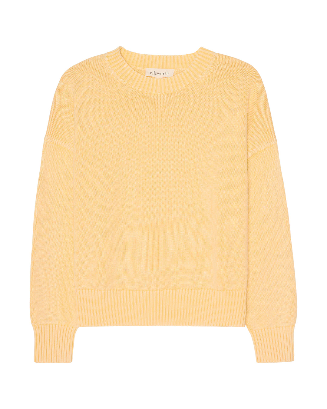 A pale yellow crewneck knit women's sweater with ribbed cuffs and hem, displayed flat against a white background. Emery Crewneck Sweater in Butter Yellow by Ellsworth & Ivey.