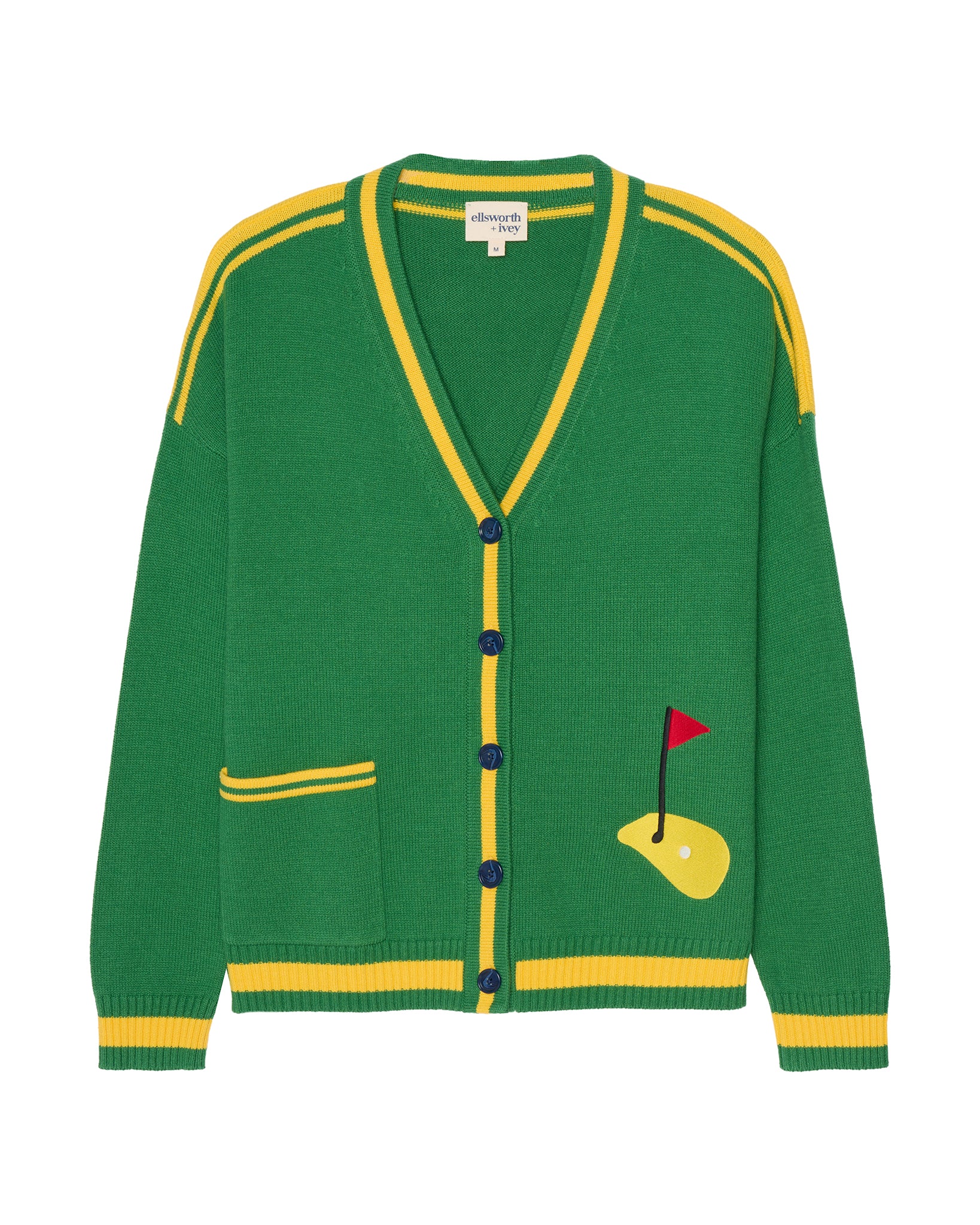 A green knit cardigan sweater with yellow trim, featuring a golf-themed graphic on the lower right side depicting a yellow golf club and flag, set against a plain white background. Emily Varsity Cardigan Golf in Green - by Ellsworth + Ivey.