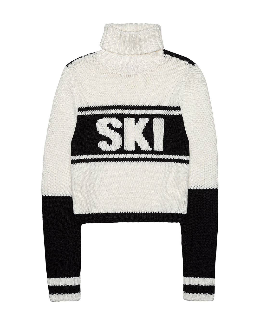A cropped knit turtleneck sweater in white and black, featuring the word 'SKI' in large white letters across a black horizontal band on the chest. Jade Turtleneck- Ski in Ivory Black by Ellsworth + Ivey.