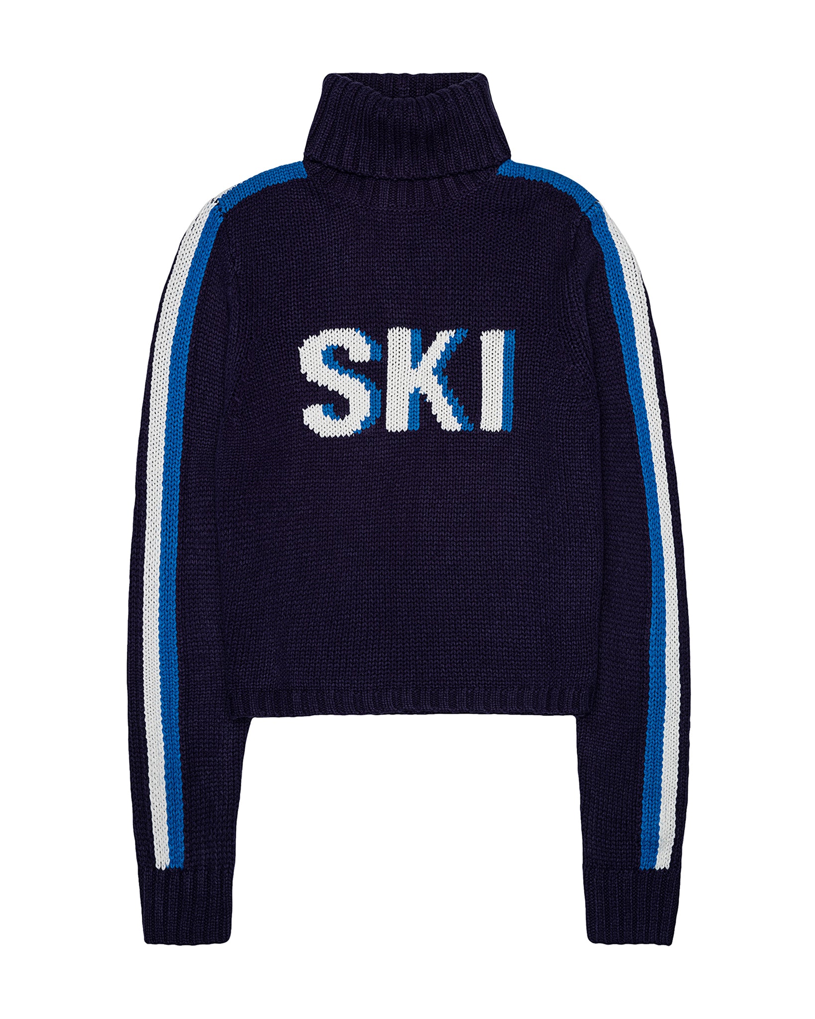 A navy blue knit turtleneck sweater with 'SKI' knitted in white and light blue across the chest, featuring white and light blue stripes down the sleeves, shown on a plain white background. Jade Turtleneck- Ski in Navy by Ellsworth + Ivey.
