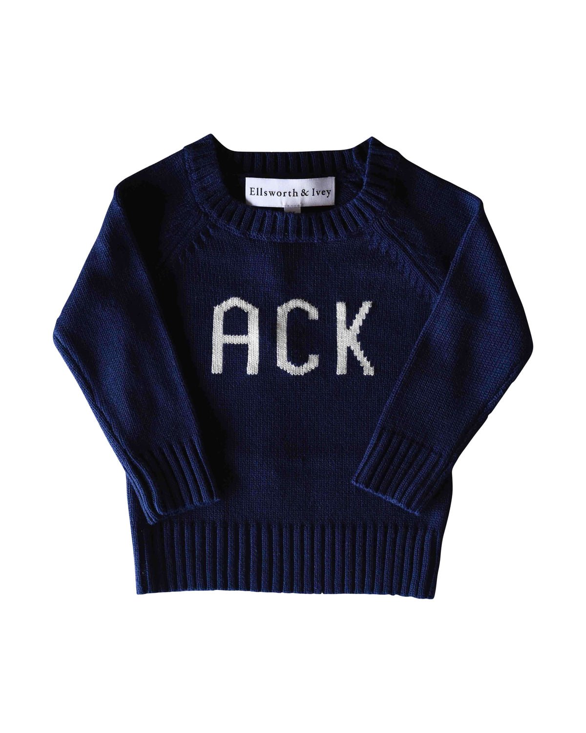 A navy blue children's knit sweater with the letters 'ACK' knitted in white ivory across the chest, displayed on a solid white background. Kids Nantucket ACK Sweater in Navy by Ellsworth + Ivey.