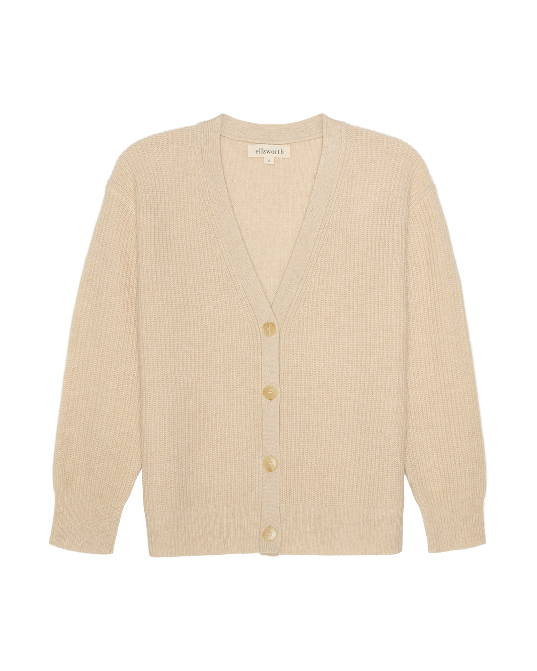 A light beige ribbed knit cardigan women's sweater with a V-neck and four gold buttons, shown flat against a white background. Lilah V-Neck Knit Cardigan in Oatmeal by Ellsworth + Ivey.