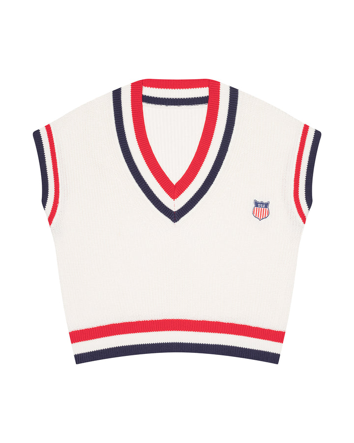 A cream-colored ribbed knit women&