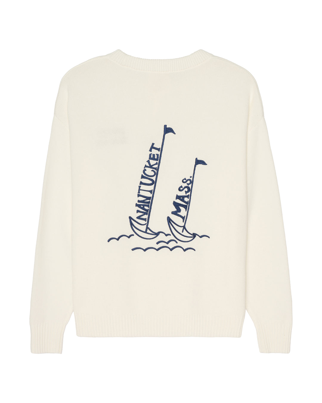 An ivory crewneck sweater featuring a navy blue graphic of two sailboats on the front, with 'NANTUCKET' and 'MASS.' printed vertically on the sails. Riley Crew Sweater - ACK Sailing by Ellsworth + Ivey.