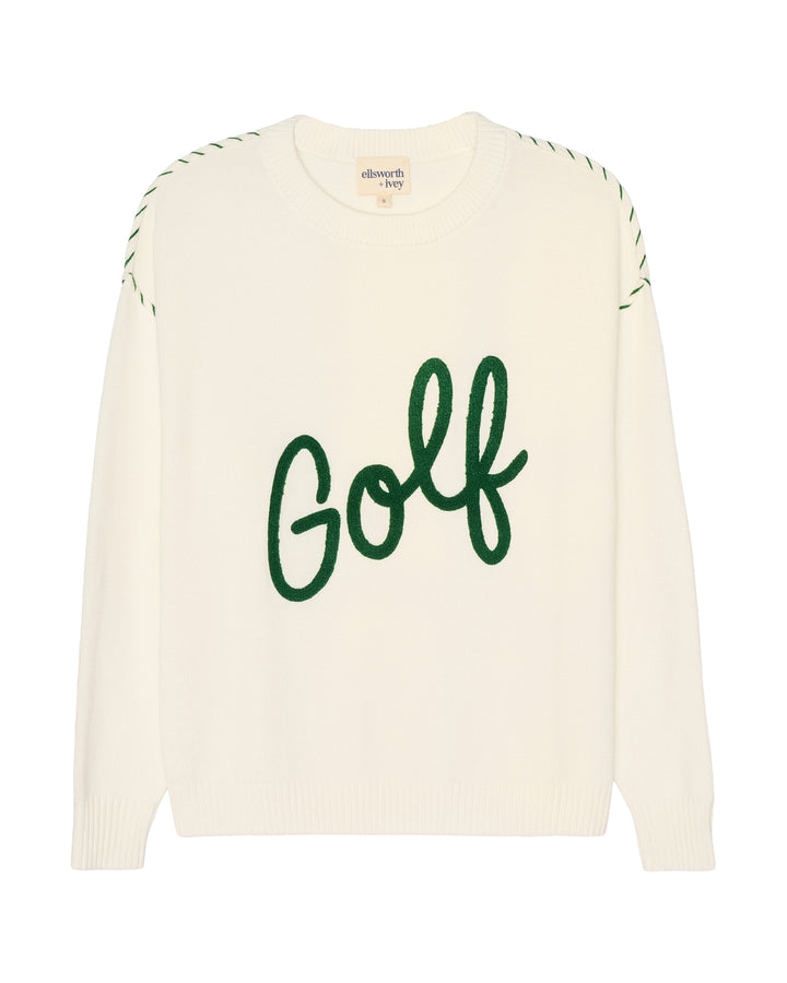 An ivory off-white knit sweater featuring the word &